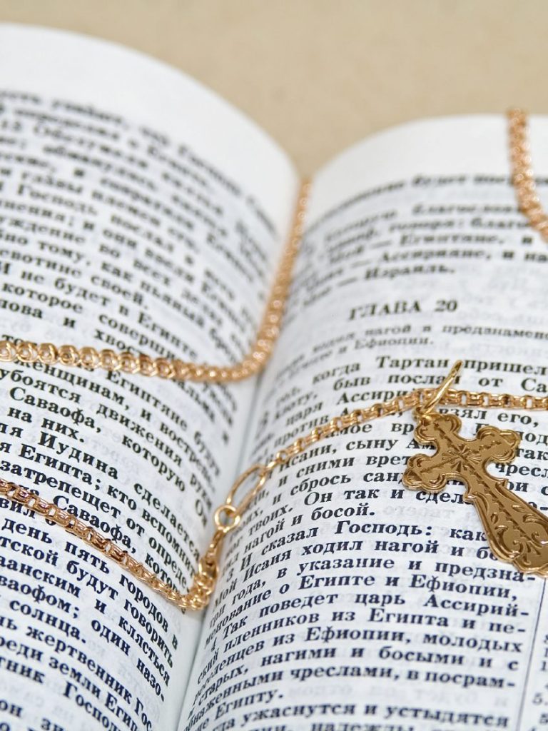 Bible with cross necklace 